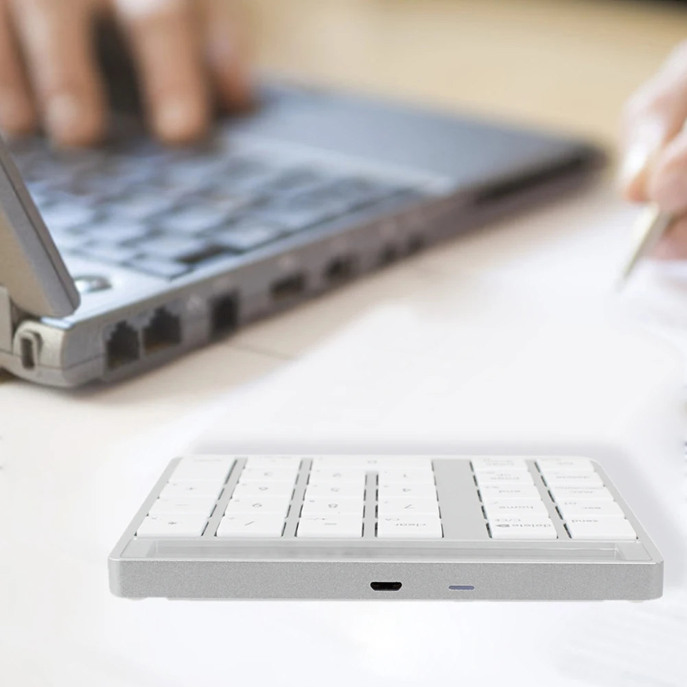 

28keys Rechargeable Wireless Bluetooth Calculator Mini Magic LCD Display Numeric Keypad Ultra Thin Computer 2 In 1 Portable