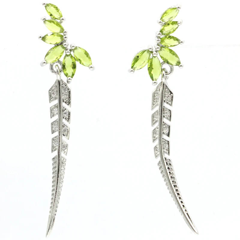 Великолепные серьги 50x12 мм из зеленого перидота с белым цирконием подарок для
