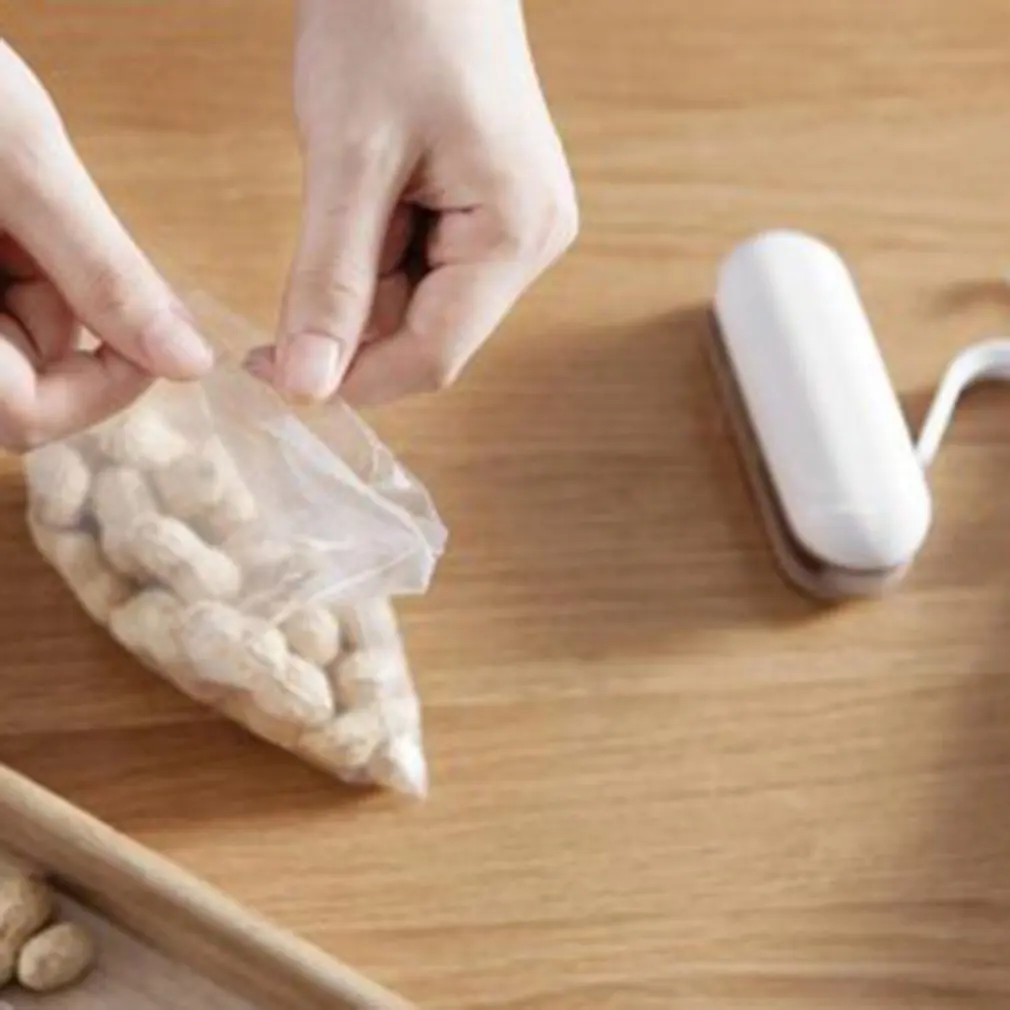 

Portable Manual Mini Sealing Machine Sealer Food Sealing Clip Hand Pressing Open Plastic Bag Simple Operation