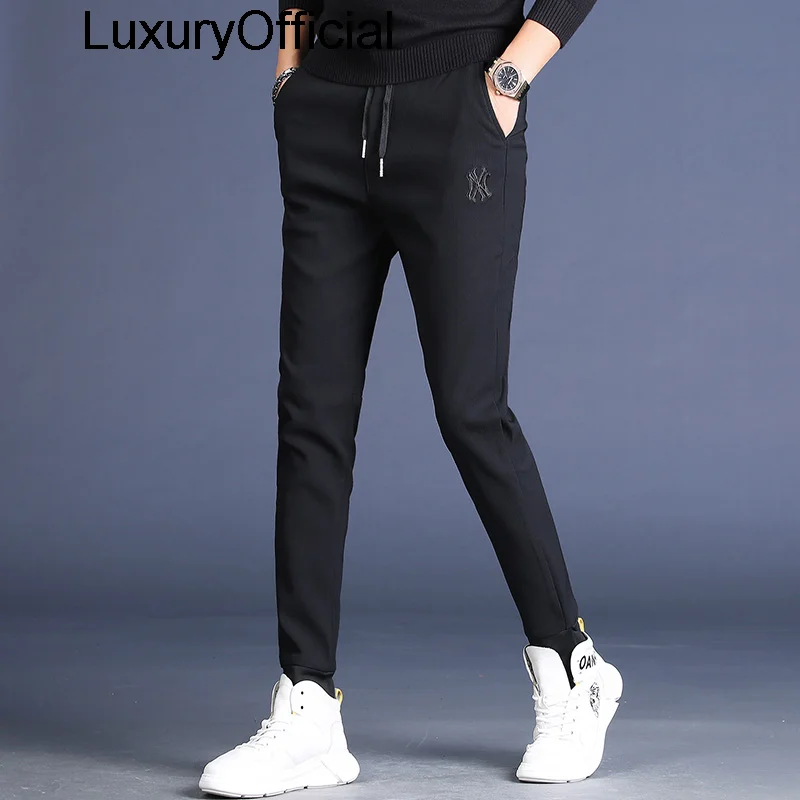 

Autumn new embroidered casual pants slim fit closure black pants version versatile Leggings long pants