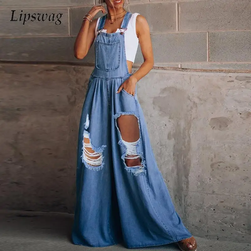 

Casual Loose Solid Pocket Denim Jumpsuit Women 2021 Sleeveless Wide Leg Overalls Playsuit Fashion Strappy Jean Romper Streetwear