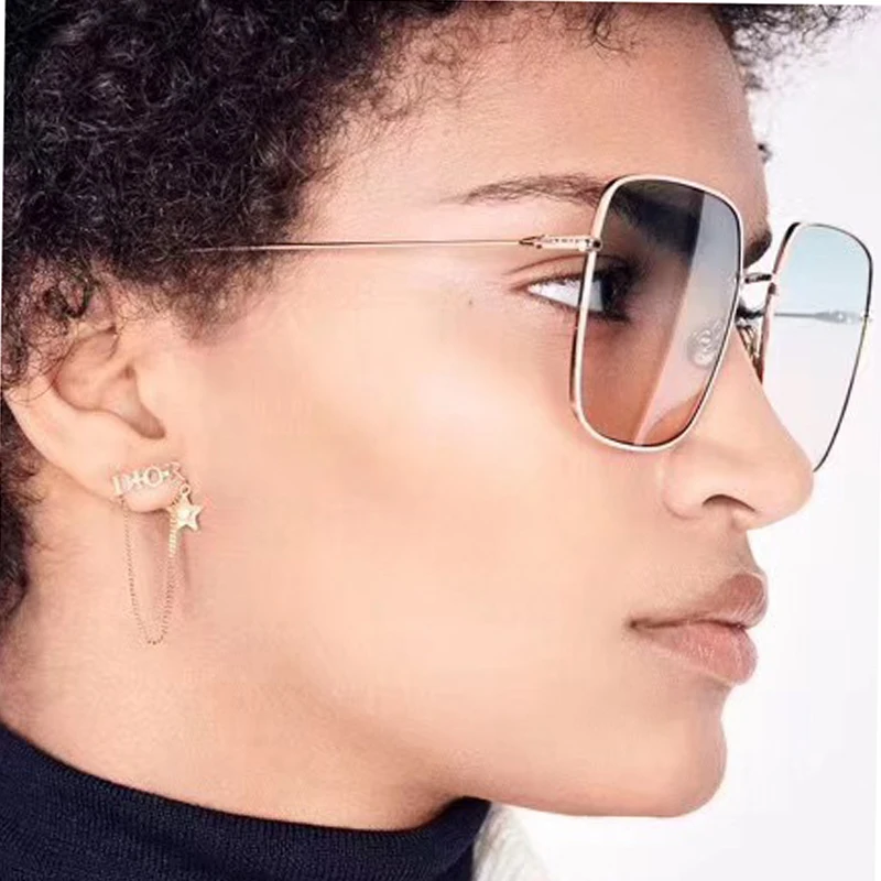 

Korean version of fashion star earrings fringe web celebrity with the same of earrings chain link letters super fairy earrings