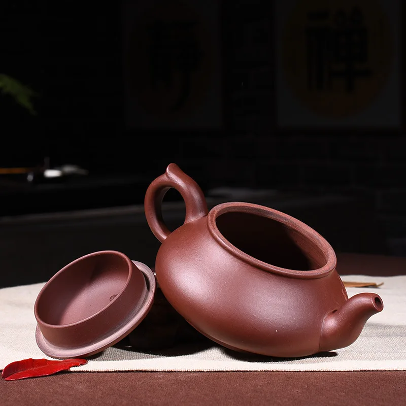 

H-097 Yixing pure purple sand pot all famous brands handmade from a kung fu tea suit manufacturer Direct Selling