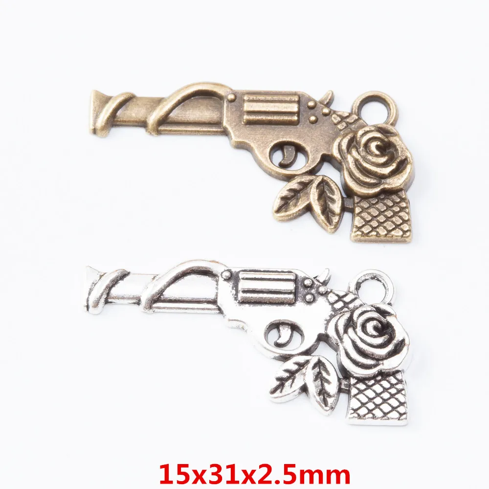

100 pieces of retro gun pendant zinc alloy pendant DIY European style jewelry making 7273