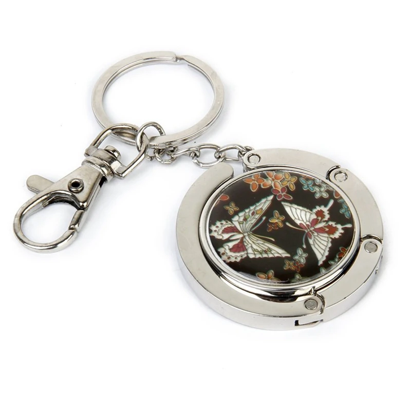 

Yellow Orange Oval Metal Foldable Handbag Purse Table Hook Hanger Holder & Bag Holder Butterfly Model with Keychain
