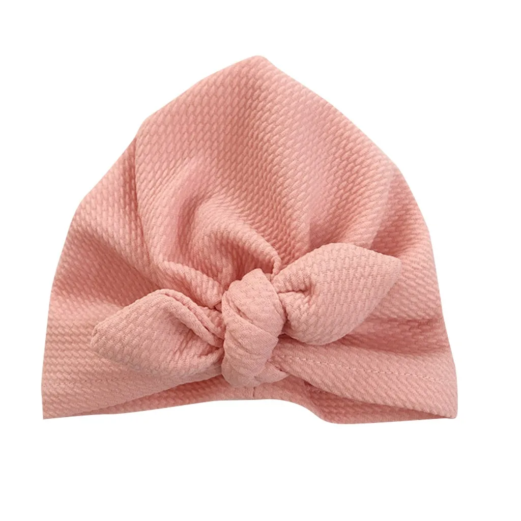 

Solido Elastico Grande Arco Cappello Del Bambino di Disegno Sveglio Unisex Cappello Tenere In Caldo di colore Solido neonato fot