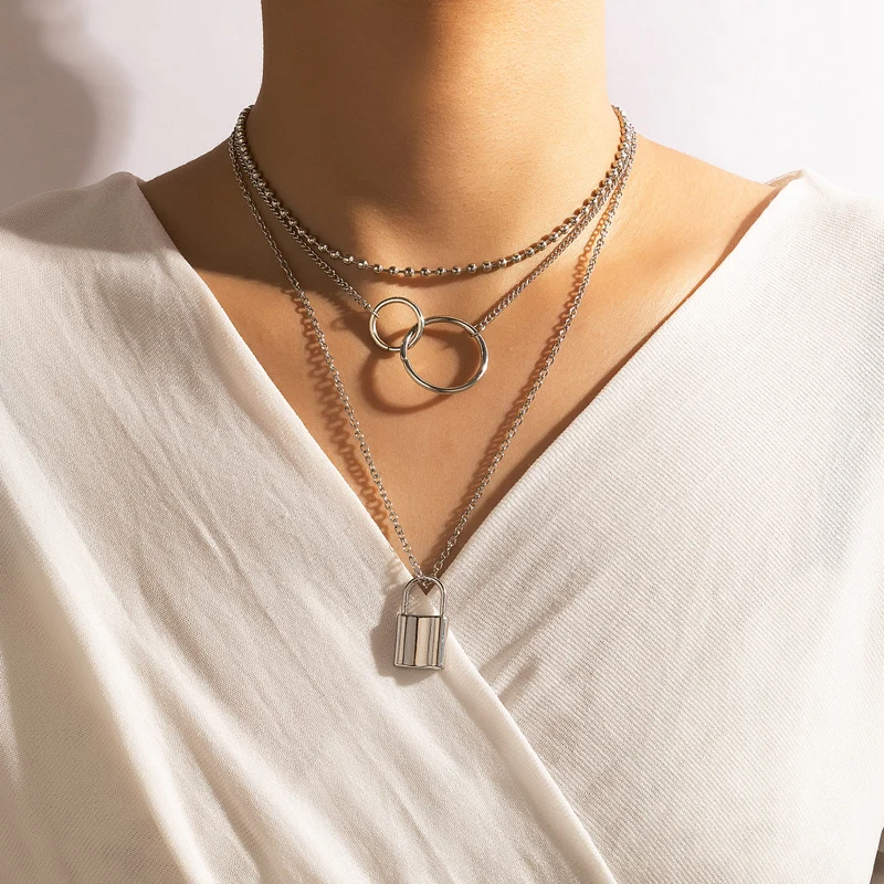 

Ожерелье женское многослойное с подвеской в виде замка Tocona, серебристого цвета, из сплава, с двумя кольцами на цепочке до ключицы, ювелирные ...