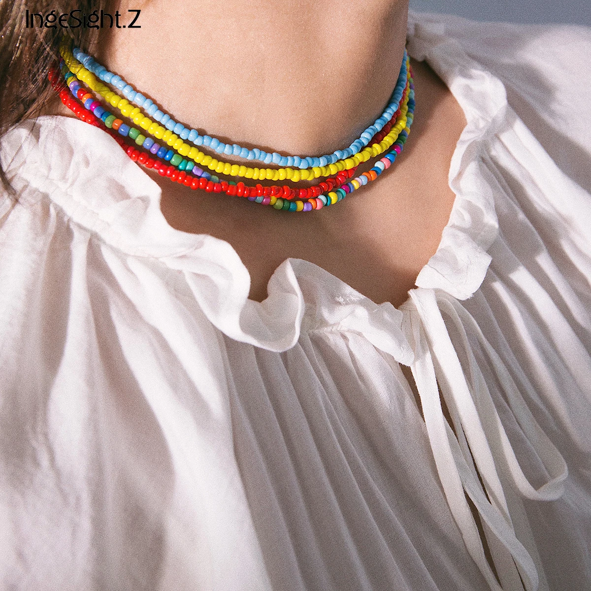 Женское колье чокер IngeSight.Z простое розового и голубого цвета с маленькими