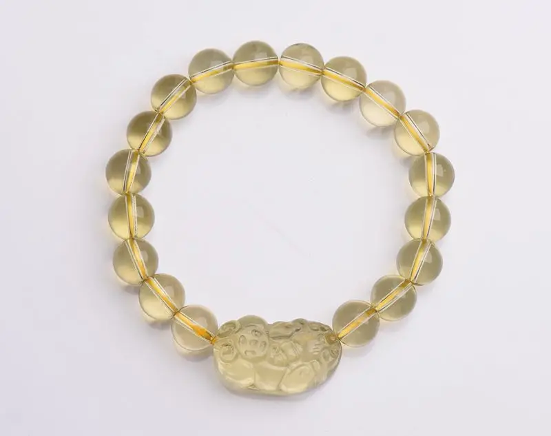 Браслет из натуральных желтых кристаллов ювелирное изделие с мотивами монет