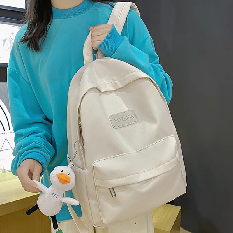 

EST Women Backpack Female Shoulders College Preppy Schoolbag Teenager Girls Mochila Mujer Casual Rucksack Kawaii Pendant Bagpack