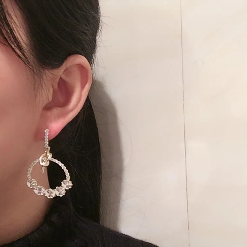 

Circle earrings female creative knotted tether design micro inlaid zircon super flash fairy S925 silver needle earrings