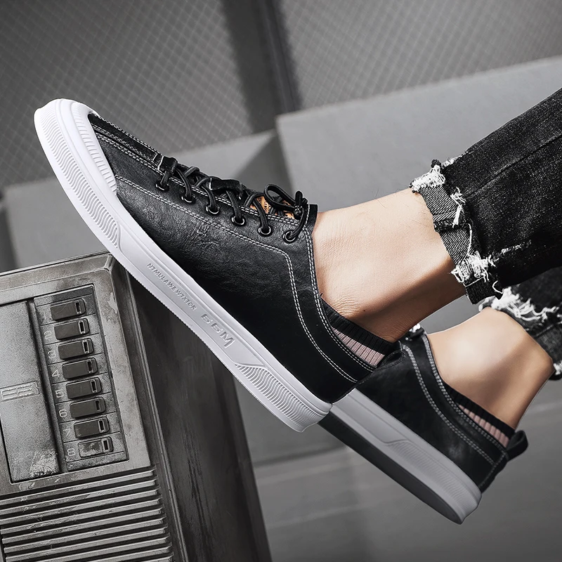 

Men Casual Shoes fashion Black Skateboarding Shoes Sport Trainers outdoor breathable Lightweight leather Sneakers men footwear