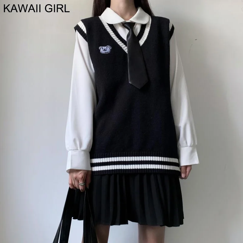 

Универсальный черный вязаный жилет без рукавов с V-образным вырезом