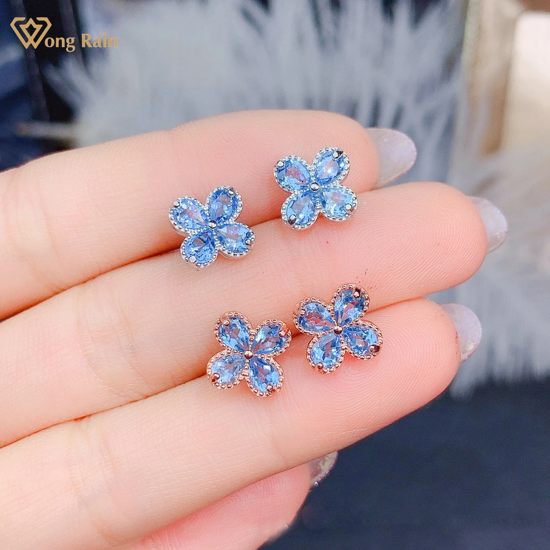 

Wong Rain Romantic 925 Sterling Silver Natural Blue Topaz Created Moissanite Gemstone Flowers Ear Studs Earrings Fine Jewelry