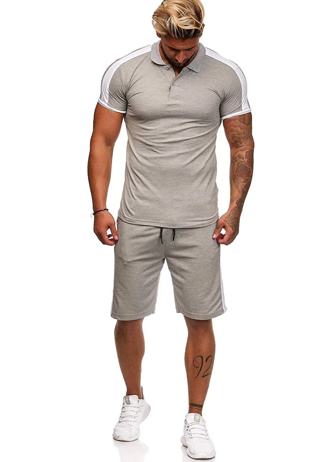 

Men's striped stitching casual hip-hop sports muscle fitness suit lapel fashion short-sleeved Polo shirt shorts suit