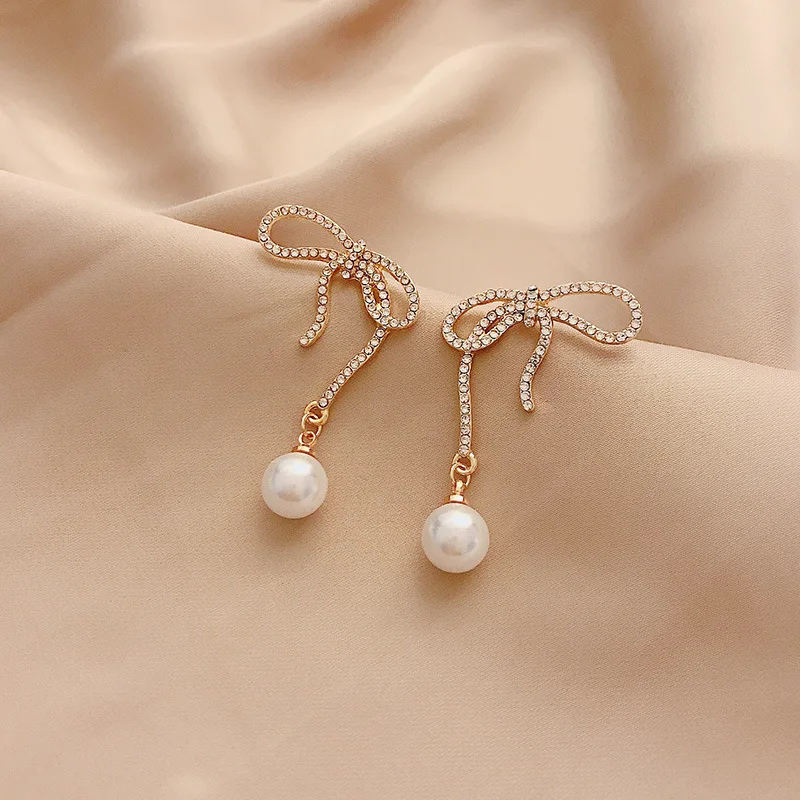 Pearl earrings feminine bow high-end personality Korean 2020 new trendy fashion elegant Fashion Stud Earrings | Украшения и