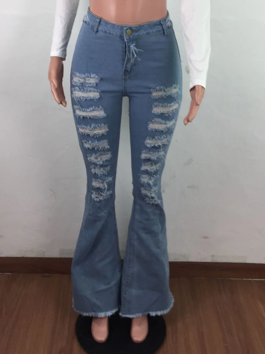 Джинсы женские рваные расклешенные с высокой талией дырки в джинсах |