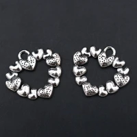 wkoud 10pcs silver color hollow garland metal pendant 12 small peach heart combination garland charm lady pendant 2725mm a46