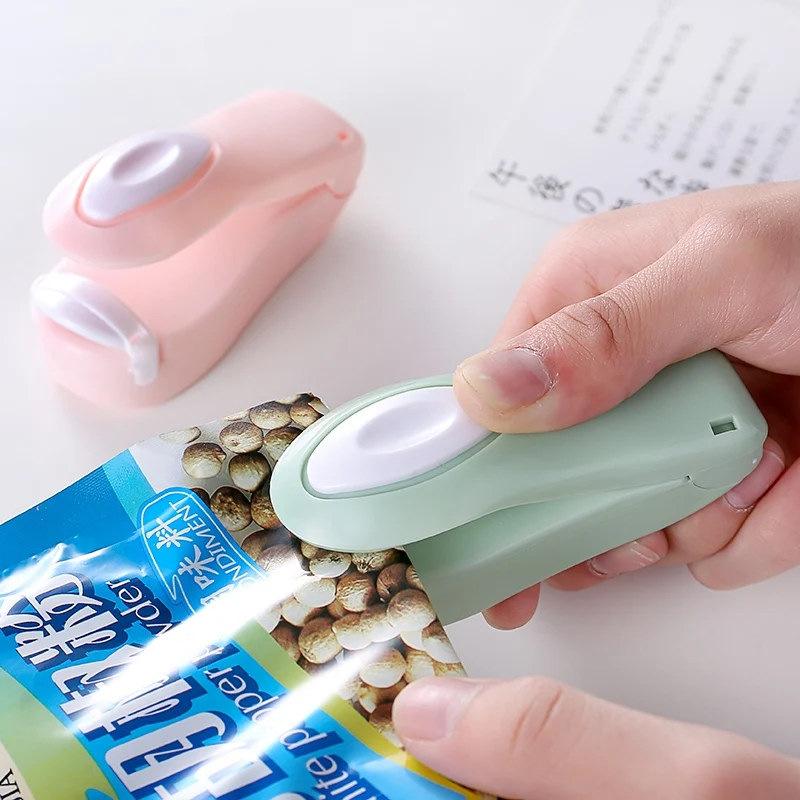 

Portable Heat Sealer Plastic Bag Storage Packet Mini Sealing Machine Handy Sealers Easy Resealer for Food Snack Kitchen Gadgets