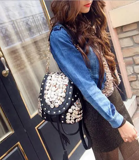 

New women bag Retro rivet buttons bag fashion casual backpack bucket bag tassel sequined High quality PU leather Female bag