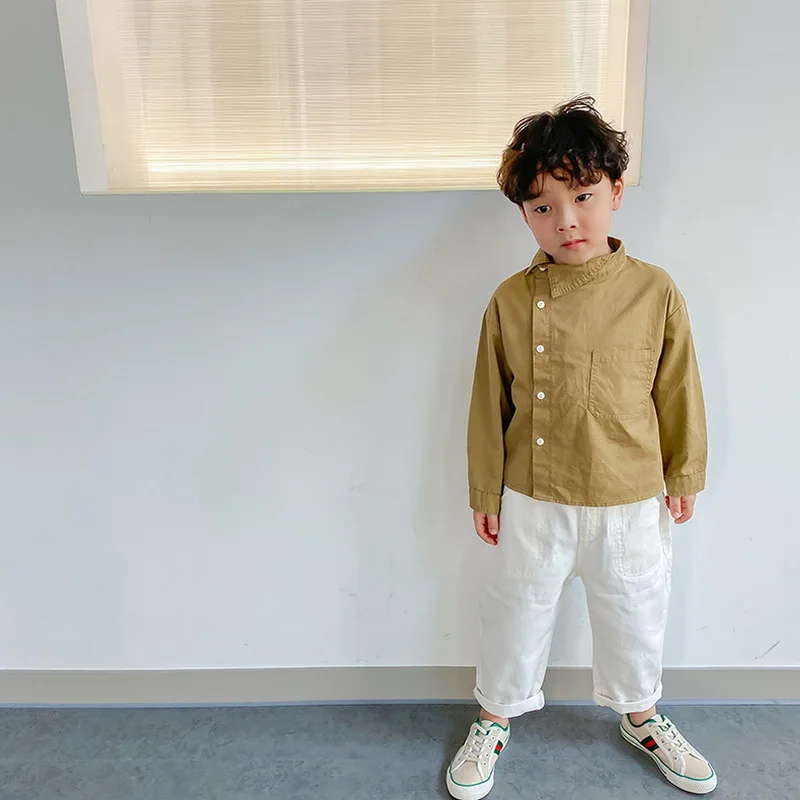 Camisa de estilo coreano para ni&ntilde;os y ni&ntilde;as, blusa informal con escote Irregular, color Beige y caqui, ropa para ni&ntilde;os de 1 a 6 a&ntilde;os, 2021-1