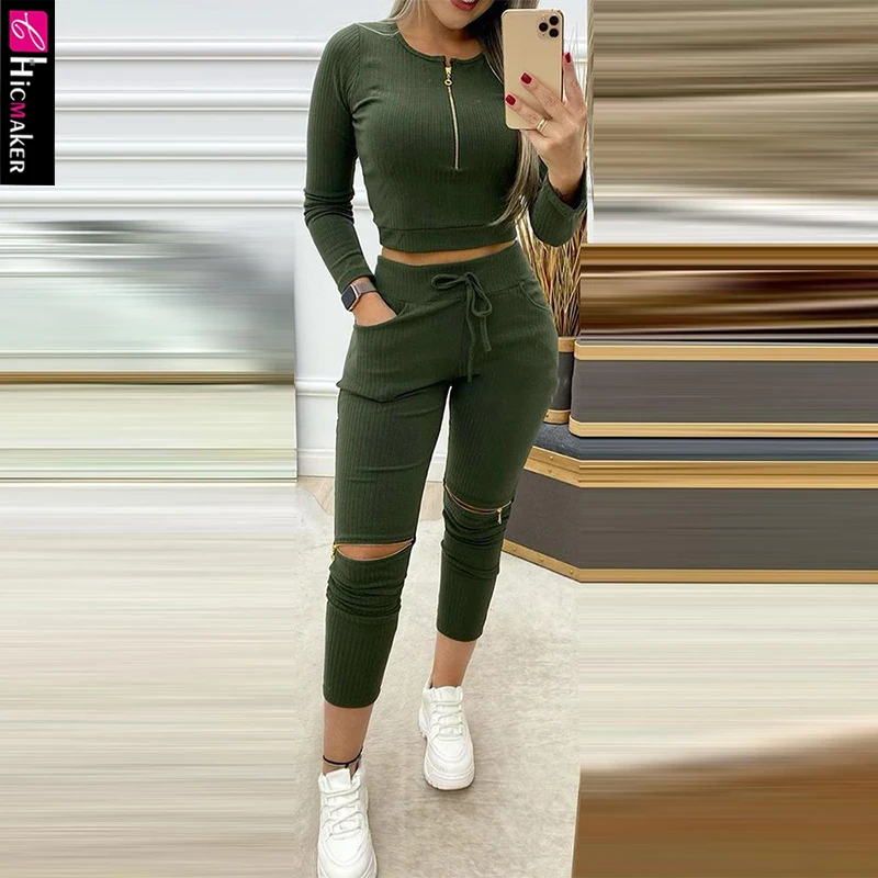 Женский однотонный укороченный топ на молнии и брюки с вырезами шикарный костюм