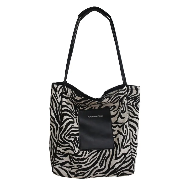 

Net red zebra pattern bag women's new versatile shoulder bag in autumn and winter 2021 fashion texture large capacity Tote Bag