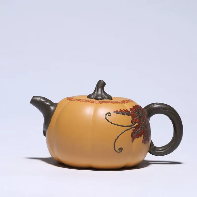 

Yixing handmade purple clay teapot two color pumpkin teapot