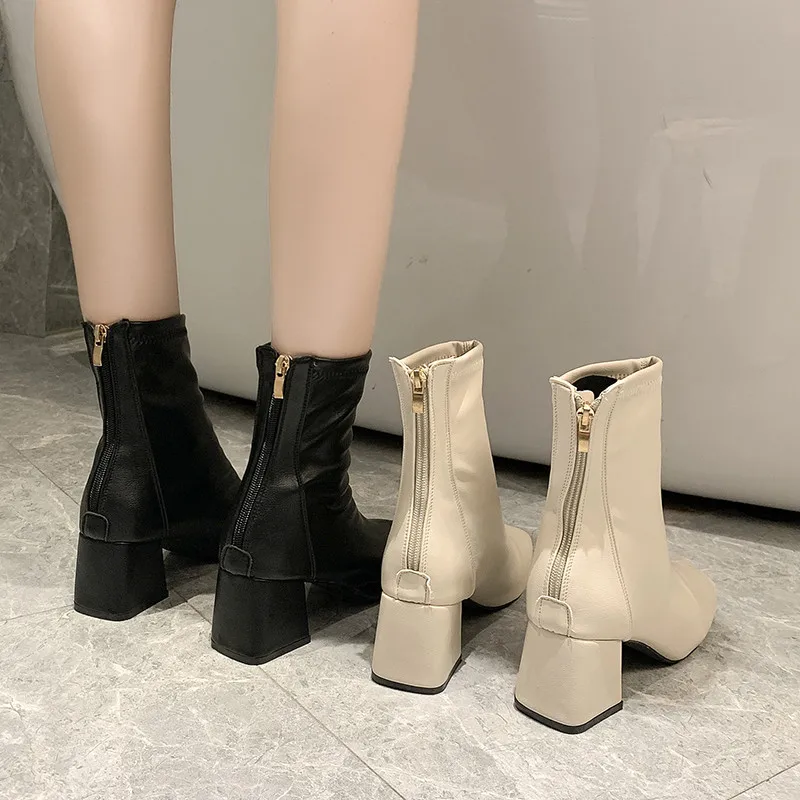 

Женские сапоги с круглым носком, до середины икры, на высоком каблуке