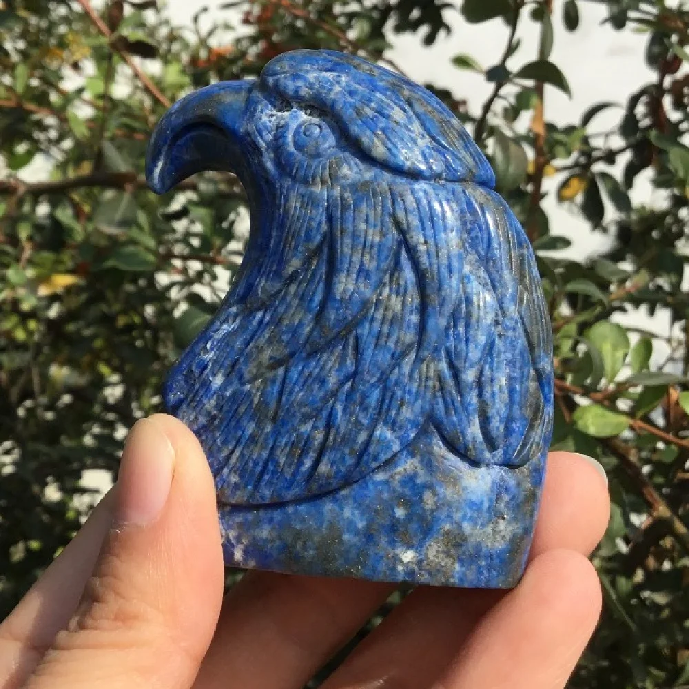 

Natural crystal stone hand-carved hawk head Lapis Lazuli eagle Crafts for home decoration