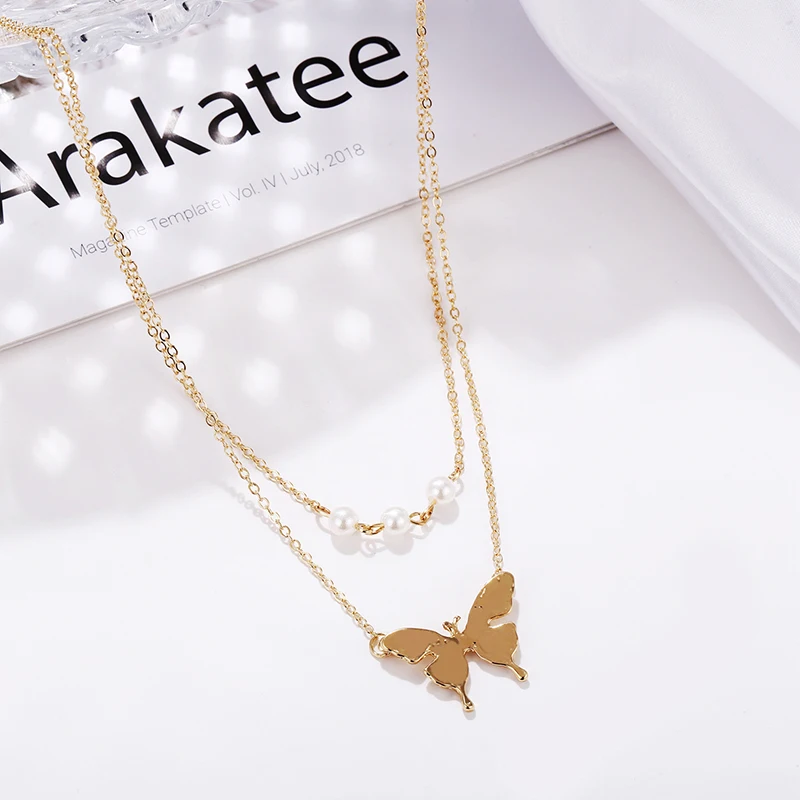 

European and American hot sale double imitation pearl butterfly pendant womens necklace for women retro clavicle chain present