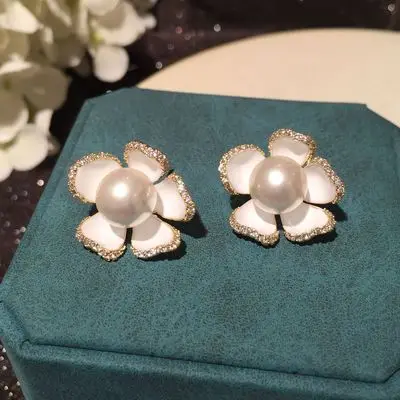 

White flower earrings female simple S925 silver needle super fairy earrings sweet earrings stereo petal earrings