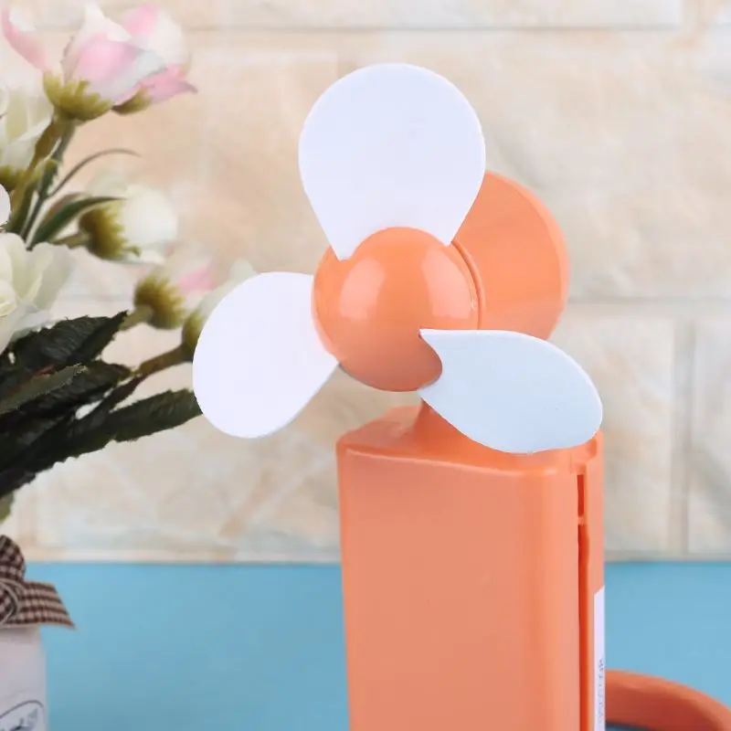 

New Mini Travel Desk Cool Air Fan Hand Held Cooling Fan Powered By 2x AA Battery Y98B