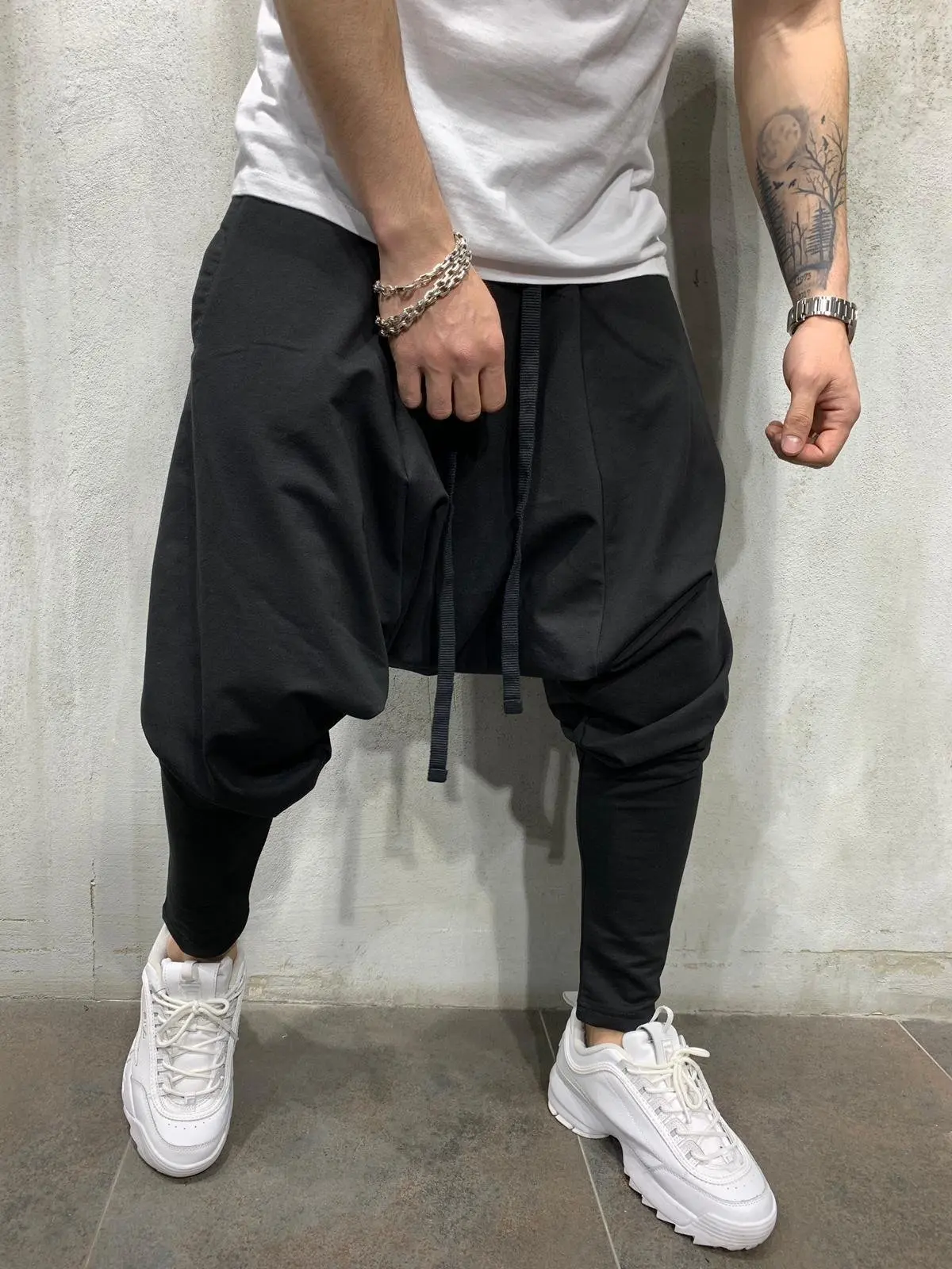 

Men's New Hip Hop Trend Trousers Europe and The United States Loose Solid Color Feet Street Sports Leisure Harem Pants