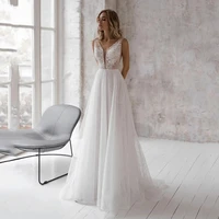 glitter wedding dresses 2022 v neck lace appliques sleeveless backless sweep train a line beach bridal gowns vestido de novia