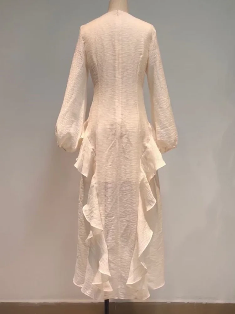 

Solid color sexy low v-neck high-waisted waist stitching ruffles irregular loose big hem dress ladies spring new styles