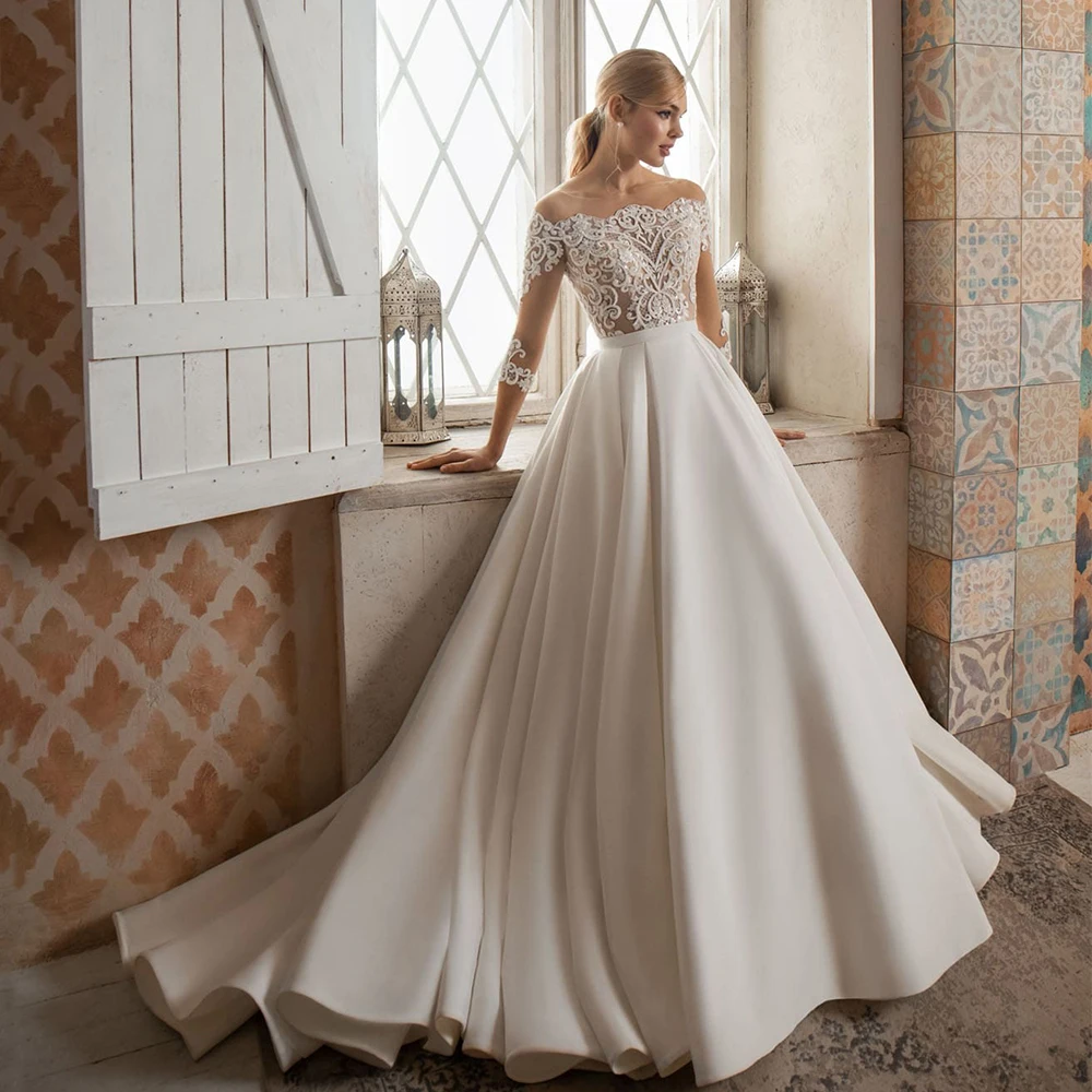 

Sexy See-through Satin Wedding Dress Boat Neck Lace Applique Bride Dresses Three Quater Sleeves A Line Gelinlik Bridal Gown