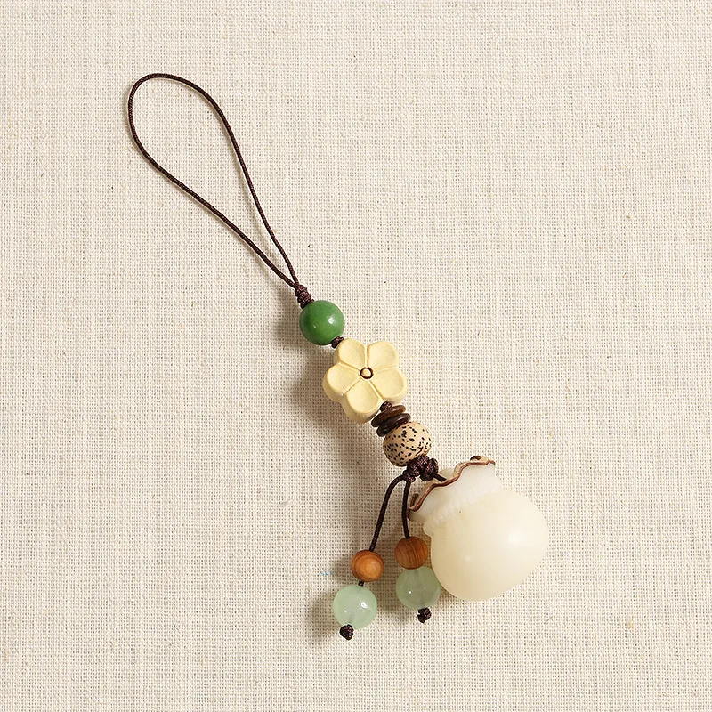 

Original DIY natural mobile phone chain hand-woven bodhi root purse blessing bag palace bell phone hanging chain bag pendant