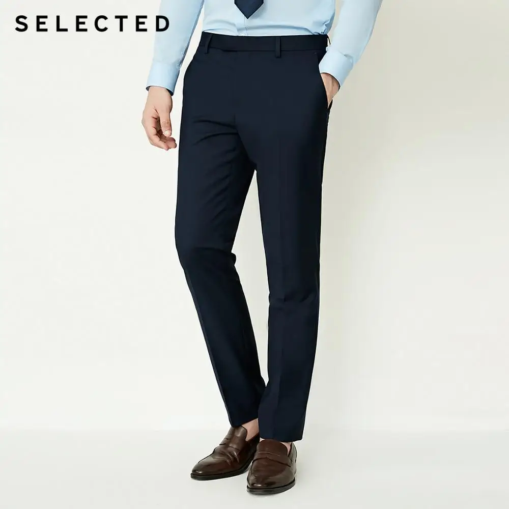 Мужские однотонные брюки для делового костюма подчеркивают нравственность