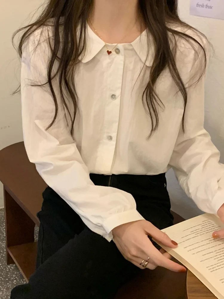 

Белая рубашка с длинным рукавом и кукольным воротником, Женский дизайнерский Топ sense 2021 на раннюю осень, темпераментная Свободная рубашка, м...