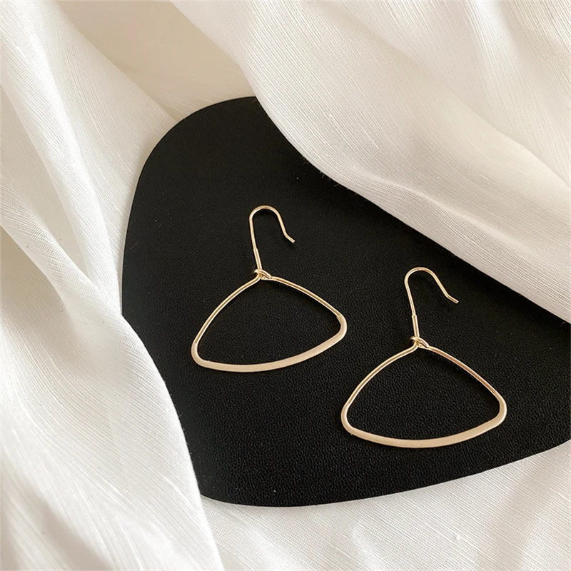 

FFLACELL Korea Dongdaemun Simple Temperament Girl Wild Personality Drip Glaze Hanger Earrings Cold Wind