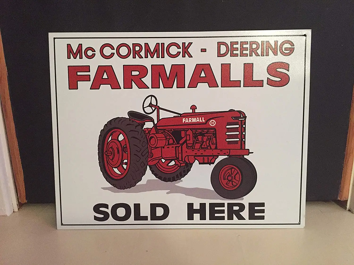 

Diuangfoong Farmalls Sold Here Reproduction Metal Sign 12" x 8"