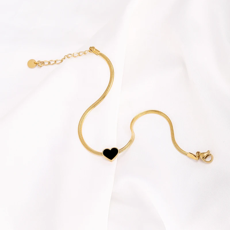 Женский браслет с подвеской в виде сердца золотистый цепочкой елочку трендовая