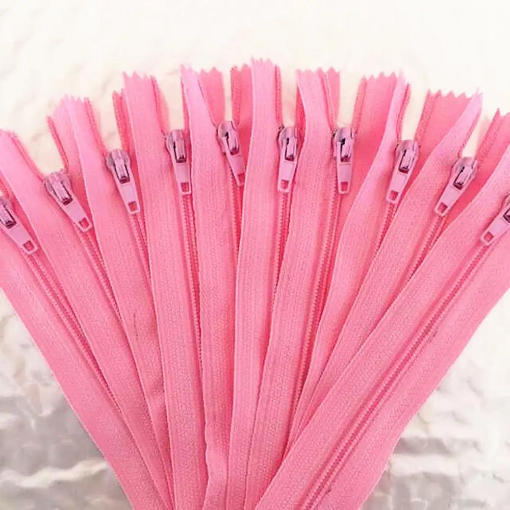 

10 pieces. Pink 50cm (20inch) nylon coil, zipper, tailor, crafter and fgdqrs