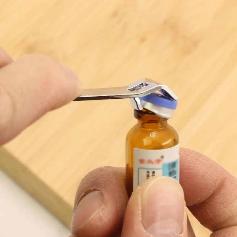 

Stainless Steel Multifunctional Portable Bottle Opener Beer Bottle Wine Ring Removal Tool Oral Liquid Bottle Opener