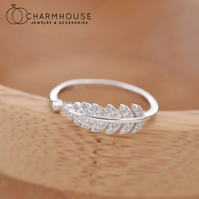 Женское кольцо из чистого серебра регулируемое с цирконием и листьями |