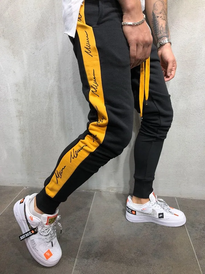 Hot Sale New Fashion Trend Men's Gym Slim Fit Long Pencil Trousers Hip Pop Tracksuit Bottoms Skinny Joggers Sweat Pants