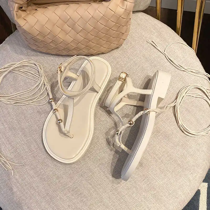 

2021 summer new Net red one line sandals women's summer Korean Roman fashion versatile clip toe strap flat sandals