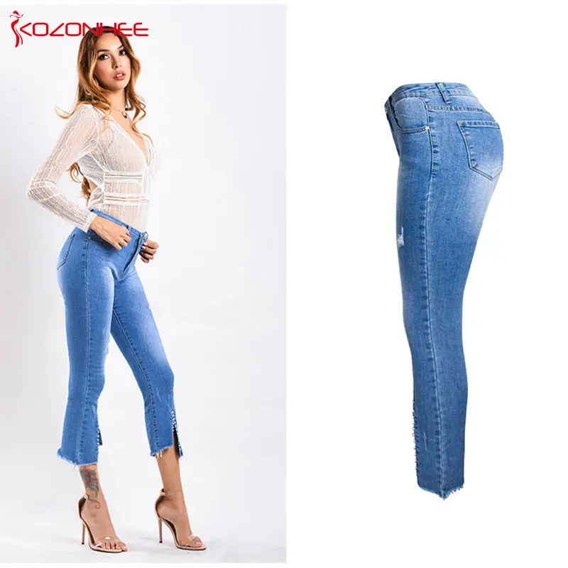 Модные вышитые расклешенные джинсы женские потертые Стрейчевые нестандартные