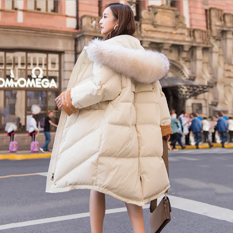 Женский длинный пуховик с воротником-стойкой однотонный теплый свободный из